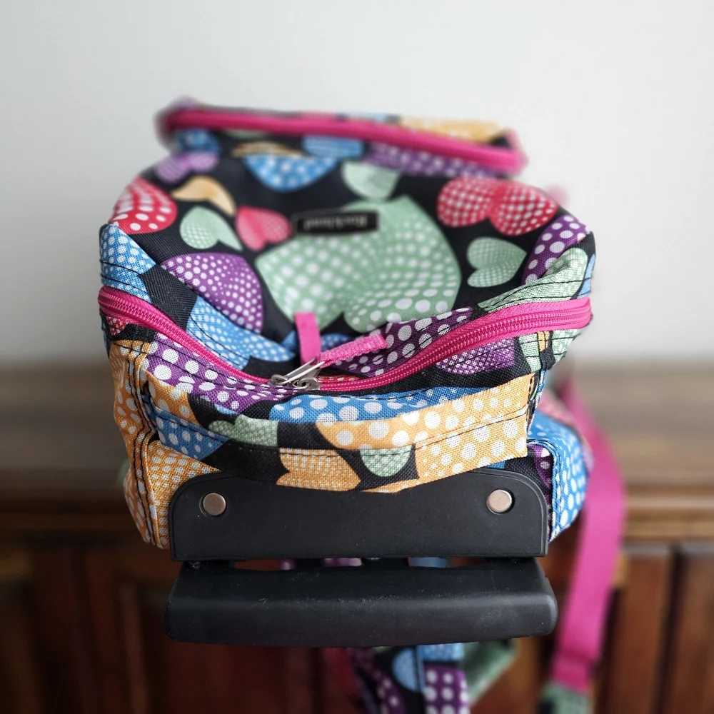 Rockland Rolling Backpack School Bag Travel Luggage Mesh Pockets New Heart 17″